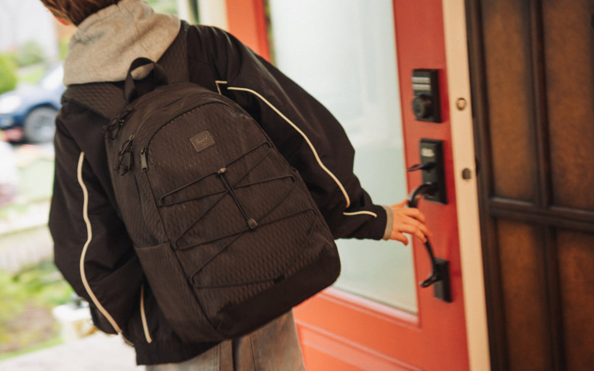Herschel Kingston Backpack in Black Diamond and Black, styled as a main lifestyle or hero product image on a plain background.